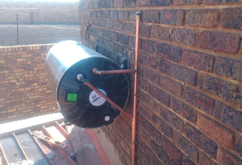 Electric geyser installation on a rooftop in Midrand, representing geyser repair services.