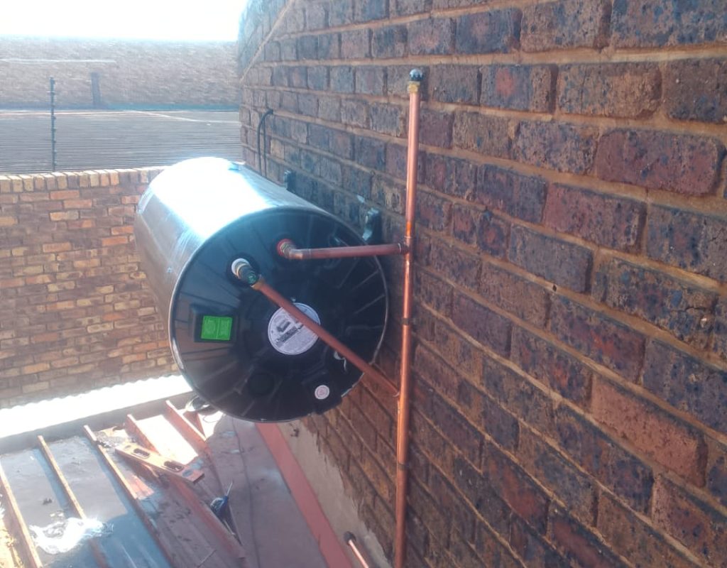 Electric geyser installation on a rooftop in Midrand, representing geyser repair services.